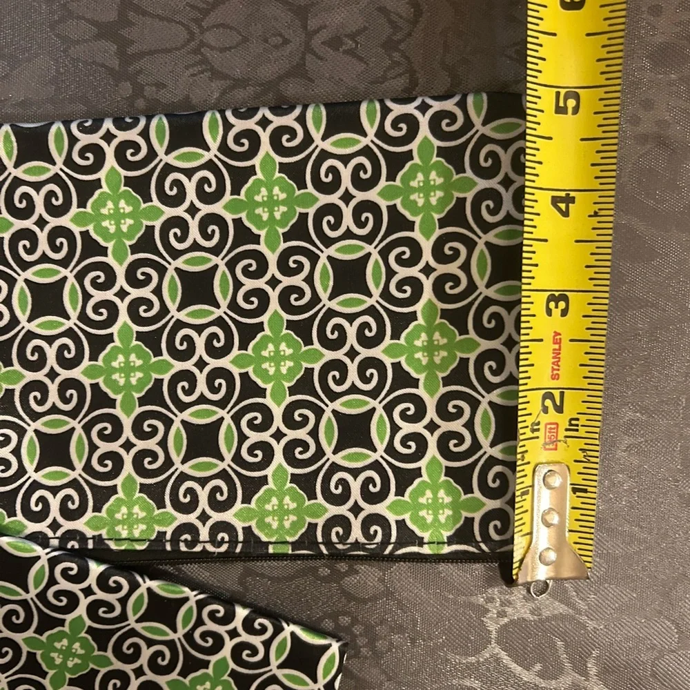 Sassy & Chic cosmetic bags featuring a green, black, and white geometric tile